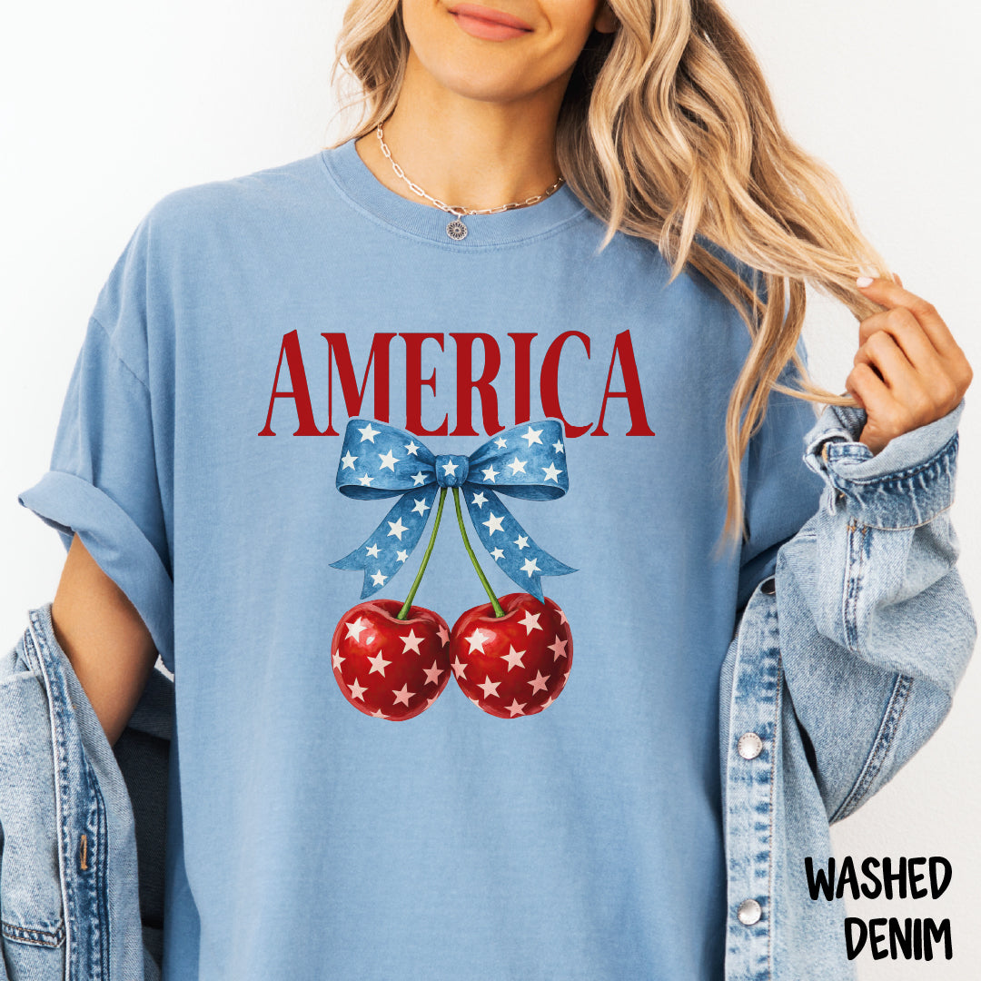 AMERICA Shirt | Coquette 4th of July Tee | Blue Star Bow with Cherries | Comfort Colors Patriotic Shirt | Cute USA Summer Shirt