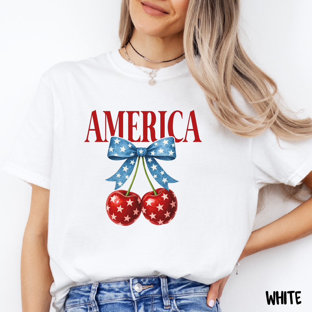 AMERICA Shirt | Coquette 4th of July Tee | Blue Star Bow with Cherries | Comfort Colors Patriotic Shirt | Cute USA Summer Shirt