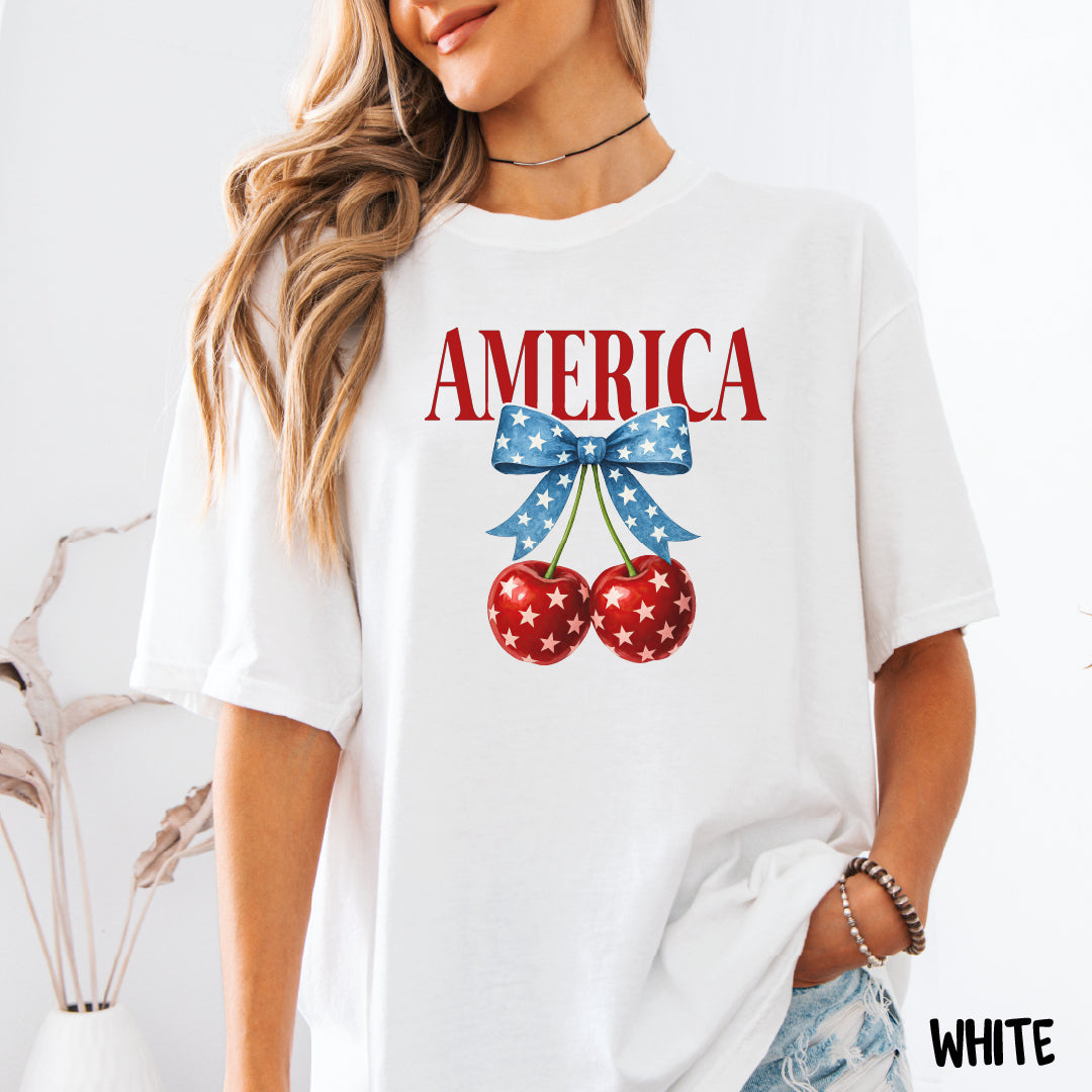 AMERICA Shirt | Coquette 4th of July Tee | Blue Star Bow with Cherries | Comfort Colors Patriotic Shirt | Cute USA Summer Shirt