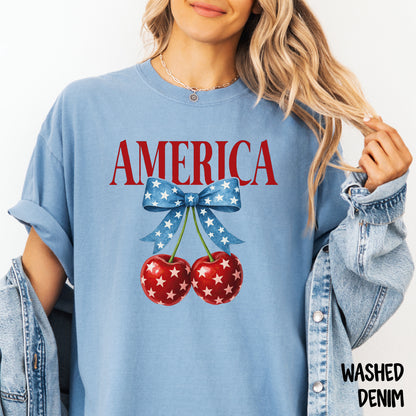 AMERICA Shirt | Coquette 4th of July Tee | Blue Star Bow with Cherries | Comfort Colors Patriotic Shirt | Cute USA Summer Shirt